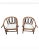 A patinated Pair of 1954 John Wisner for Ficks Reed Rattan Lounge Chairs in Campaign Style. Come with removable white...