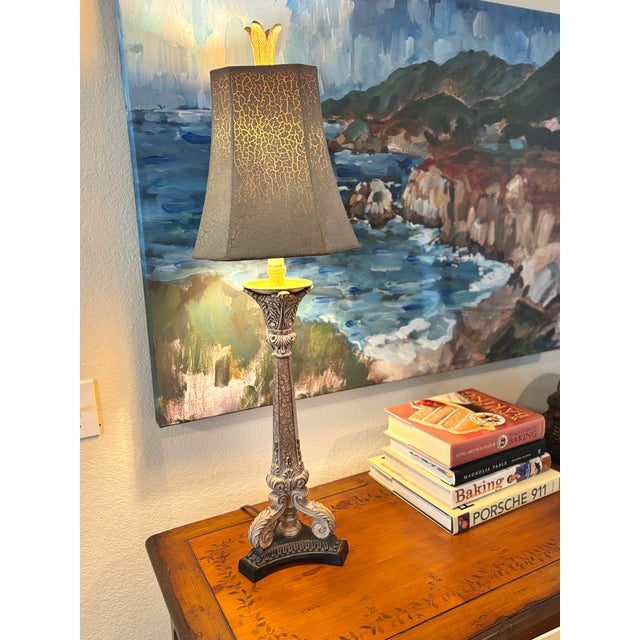 This elegant Neoclassical Buffet Lamp serves as a striking vertical accent for a sideboard, console, or entry table. The...