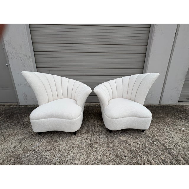Pair Of Asymmetrical Channel Back Lounge Chairs Attributed To Grosfeld House. This stunning pair of Hollywood Regency...