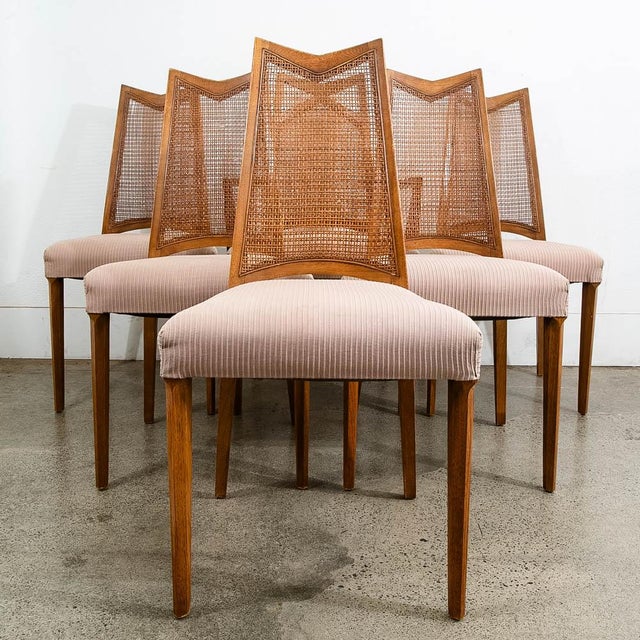 Beautiful set of 6 high-back, cane back dining chairs with one captains chair. Part of the Pinnacle line by Drexel C 1970....