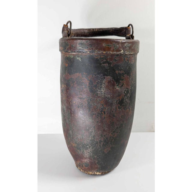 We are selling this great looking 19th century Leather fire bucket with green painted surface. This piece is all about...