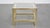 This beautiful Hollywood Regency side/coffee table with a glass top and gold/silver mirror edge. This beautiful table can...