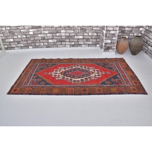 Turkish Vintage Anatolian Wool Area Rug, Bold Red Field With Navy Blue Geometric Medallion For Sale - Image 3 of 10