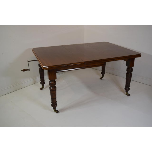 antique dining table with crank