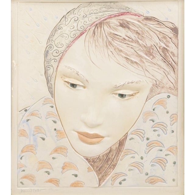 A refined figurative ceramic tile titled "Woman in the Rain" by Frank Gallo. Circa 1980s. Signed on the lower left with an...