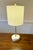 This lamp beautifully combines natural and manufactured elements. The white marble base featuring distinctive veining...