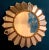 Beautiful gilt sunburst mirror, with a round mirrored glass center in moulded frame. Measures: Diameter 100cm It is a...