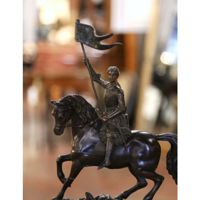 Decorate an office of a study with this elegant statue of Joan of Arc, the iconic French heroine and saint. Crafted in...