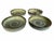 Set four hand thrown ceramic bowls. Each glazed bowl feature a rustic textured surface in earth tones of eggshell and...