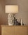 The coastal vibes of the Corfu Ivory Table Lamp are created by the tremendous amount of effort that into the surface...