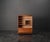 This Art Deco filing cabinet from the 1930s combines practical functionality with timeless design. Its tambour door...