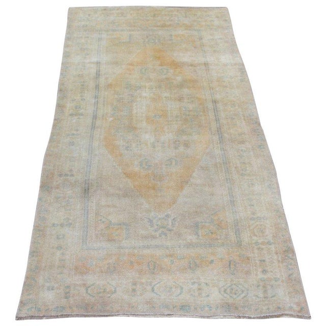 Hand-knotted with care using traditional rug-making techniques, this wool rug blends timeless craftsmanship with a modern...