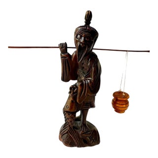 Title: Vintage Hand Carved Wood Fisherman Figure With Shoulder Pole For Sale