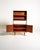 Scandinavian bookcase from the 1950s and 1960s, crafted from teak with oak inserts. The structure is composed of two...