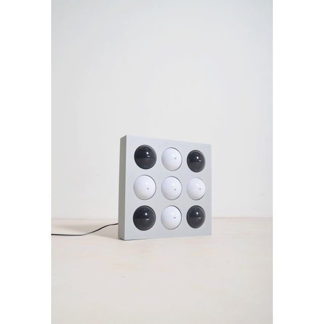 Special Fifty Fifty lamp designed by the Swiss Paul Talman in 1965 and produced by Interaktives Licht Köln. The lamp...