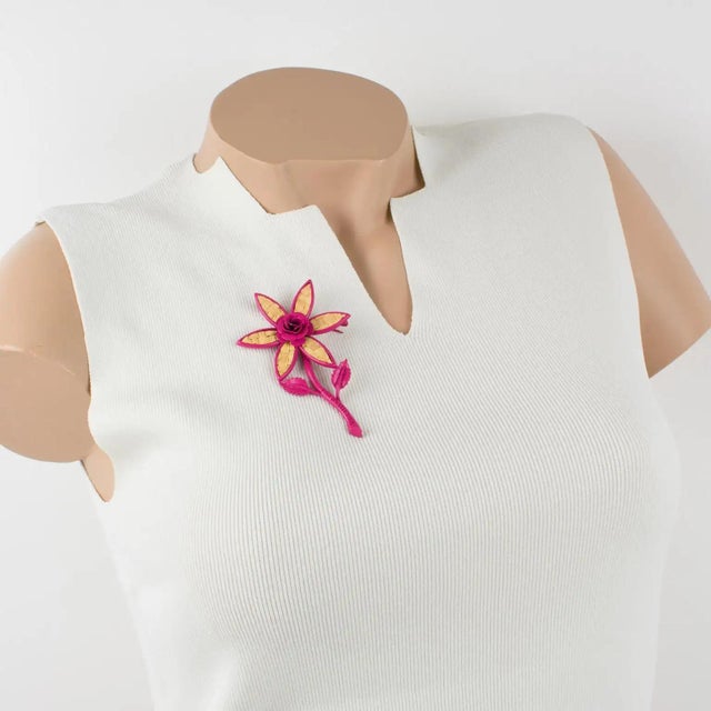 This superb John Galliano Paris brooch features an oversized, dimensional daisy-shaped flower in hot pink enameled metal,...