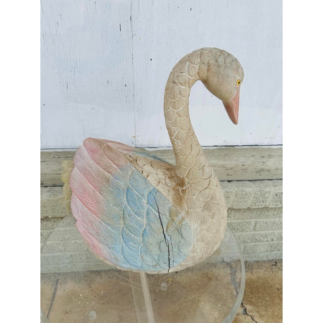 A charming vintage hand-carved wooden swan sculpture featuring beautifully detailed feather carving and a graceful,...