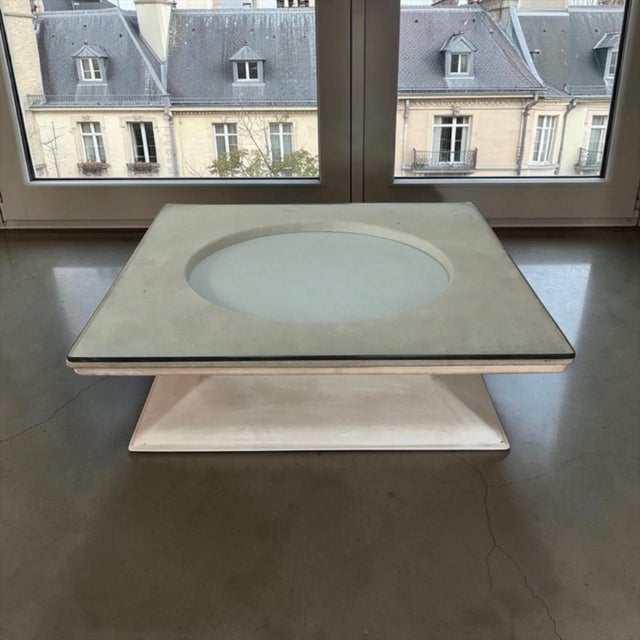 An Italian Mid Century Modern illuminated coffee table from M.I.M. Roma, designed as sculpture and light source at once. A...