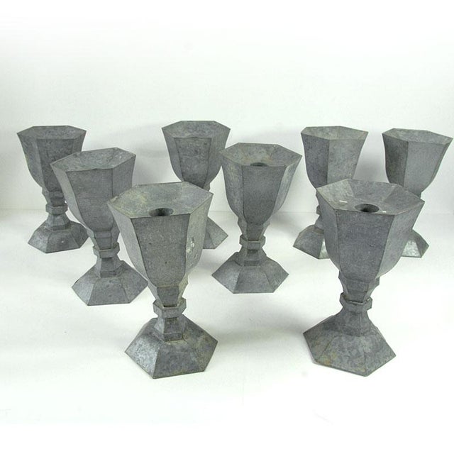 A set of decorative, handmade table candle holders from the 1960s. They are made of thin, soldered galvanized sheet metal....