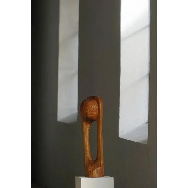 A wooden sculpture by Danish artist Ole Wettergren, created in the 1980s. Titled "Den eftertænksomme" (“The Thoughtful”),...