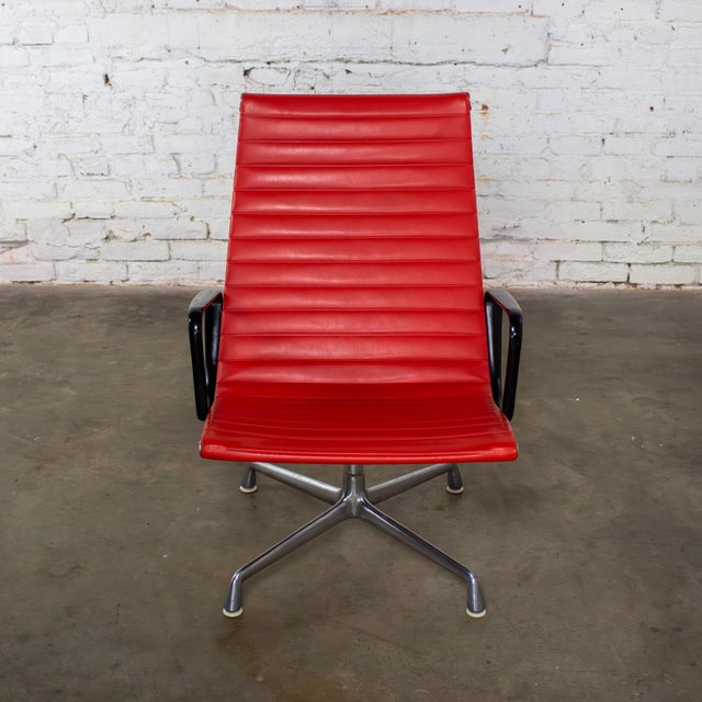 Iconic vintage MCM or Mid-Century Modern Charles & Ray Eames for Herman Miller Aluminum Group stationary high back lounge...