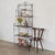 Wonderful Provincial wrought iron étagère from France, 1930s. Open iron shelf with wood ball finials and scroll detail....