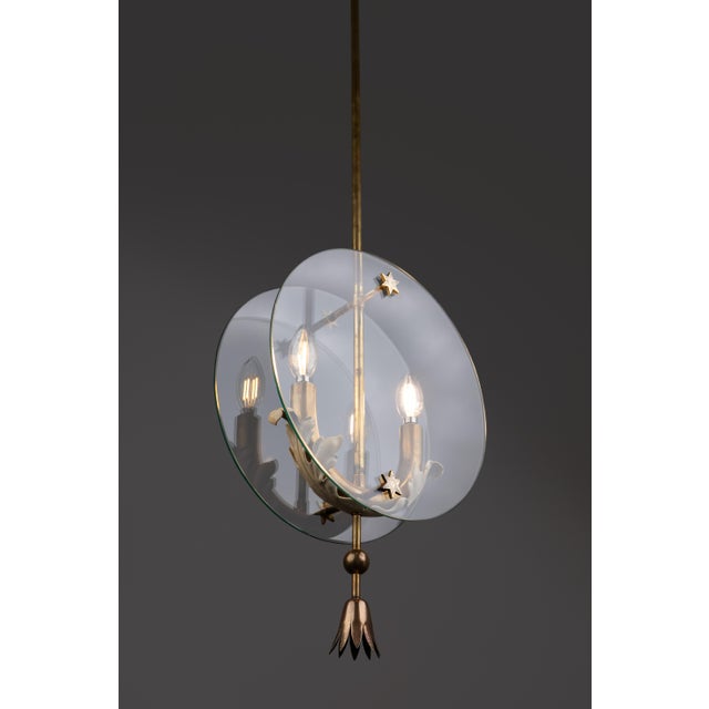 A rare brass chandelier attributed to pietro chiesa was made in italy in the 1930s. Impeccable handwork, where glass,...