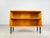 Beautiful small teak sideboard/lowboard from the 1960s. The furniture is ideal as a TV board and can be easily integrated...