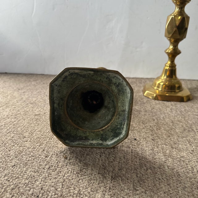 Pair of brass candlesticks from the mid-19th century. In very good shape and professionally polished.