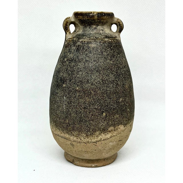 A original antique Chinese Stoneware with brown glaze Vase from the Song Dynasty (960-1279) Measuring approximately 6”...