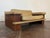 1980’s tan / beige leather loveseat in good vintage condition, minor discoloration, scratches on the leather and on the...