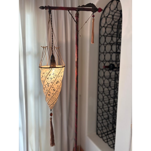 This design of Mariano Fortuny’s was probably the first electric floor lamp. The elegant Fortuny® Cesendello silk floor...