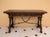 Spanish drop-leaf console table dating from the 1940s. Crafted in wood, it features two front drawers, turned legs, and...