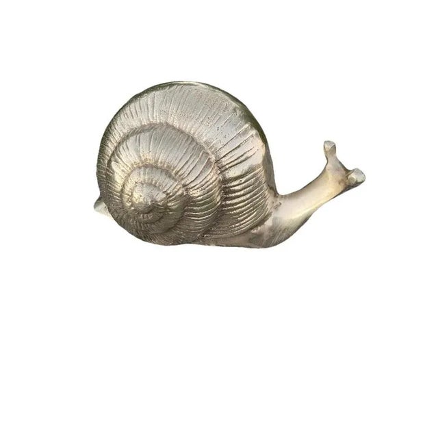 Vintage brass snail great possibility Incorporating a brass snail as a decor piece : displaying it on shelves, desks, or...
