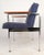 Stunning vintage modern armchair features soft vintage royal blue upholstery, 19" seat height, and wide wooden armrests....
