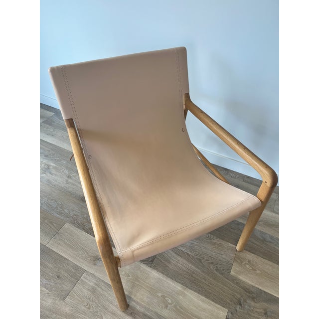 Like new - Brand is Barnaby Lane (Australia) H30.5" x W26.3" x D29.7" Ground to seat 15.3" Arm height 21.2" Cowhide...