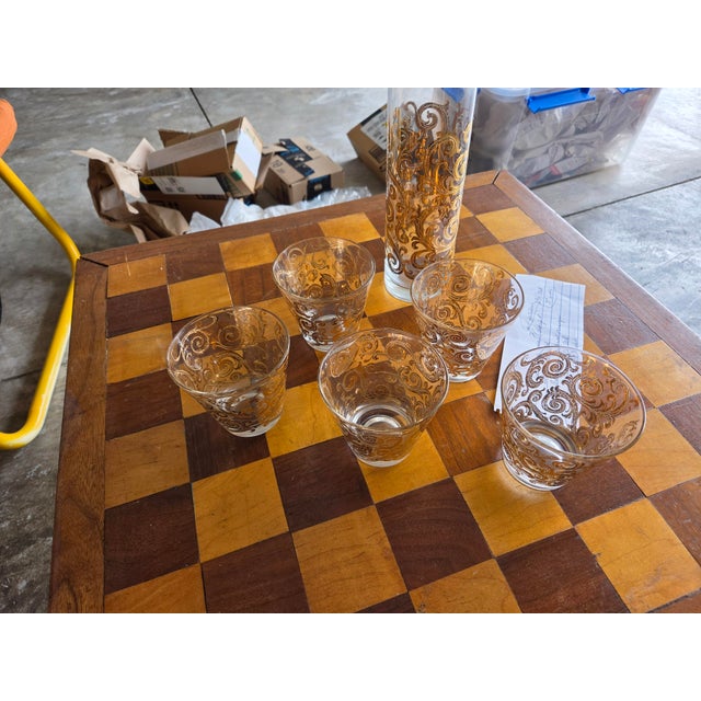 Set of 5 Culver glassware and Pitcher With 22kt gold baroque pattern design.
