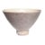 A heavy decorative stoneware bowl in pale purple. This bowl will be fabulous sitting on a coffee table, in a kitchen...
