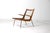 Lounge chair designed by Peter Hvidt and Orla Møgaard-Nielsen during the 1950s in Denmark. The frame is constructed from...