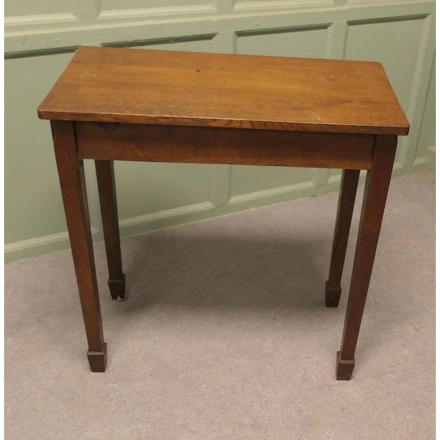 Arts and Crafts Oak Occasional Table or Side Table This is a good quality piece made about 1890 on tapering square legs,...