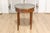 This elegant French bouillotte table, crafted in the early 20th century, embodies the timeless sophistication of the Louis...