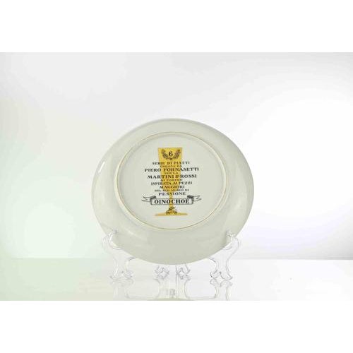 This Oinochoe is an elegant silk-screened porcelain plate, designed by Piero Fornasetti for Martini&Rossi in 1960s . This...