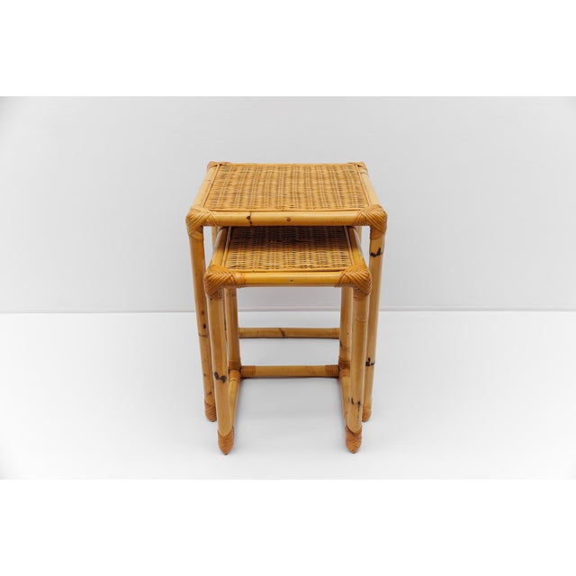 Very nice, understated yet very typical bamboo & rattan side tables. Two different heights: 44 cm and 53 cm The base areas...