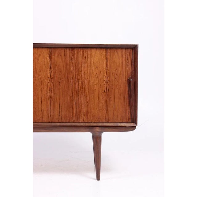Great looking sideboard in rosewood designed by Gunni Oman for Oman Jun, Denmark in 1960s. Great original condition. I...