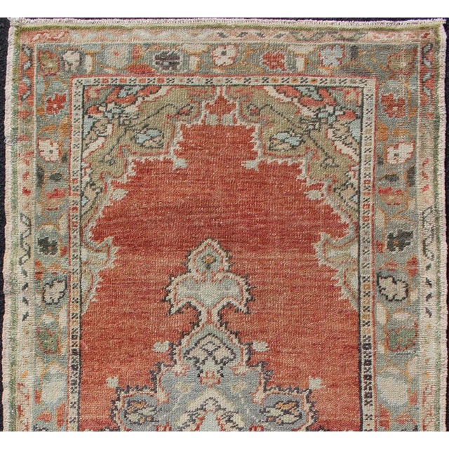 Layered floral medallion design in muted Orange red and taupe/ green Oushak vintage rug from Turkey, colorful and muted...