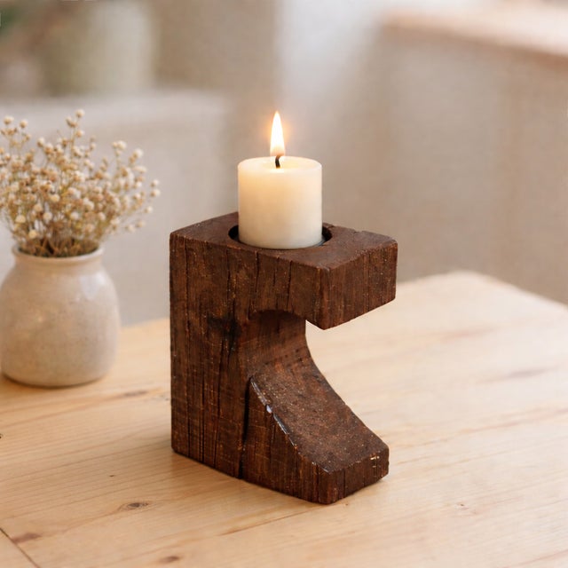 Dimensions: 5" W x 3" D x 7" H Aged wood with natural crevices has been used to craft these rustic candle holders.