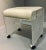 Very nice vanity bench by hill manufacture, comes with vinyl cushion, has 4 wheels.