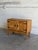 Beautiful vintage Danish oak cabinet in the style of Henning Kjærnulf, featuring rich solid oak grain, hand-carved...