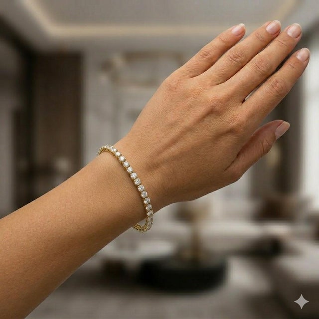 18k Straight Line Tennis Bracelet with 46 round brilliant diamonds weighing 5.50 carats. 17.93 grams