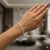 18k Straight Line Tennis Bracelet with 46 round brilliant diamonds weighing 5.50 carats. 17.93 grams
